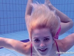 Proklova strips off swimsuit and dives underwater seductively