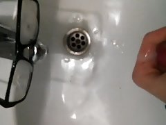 Huge cum splash on glasses!
