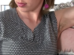 On her sofa, Sasha K takes off dress to relax