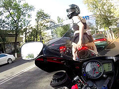 wonderful Almaty femmes riding motorcycle