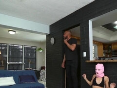 She wears a robber mask and gets caught by a person