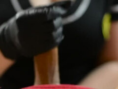 Masseuse handjob in latex gloves