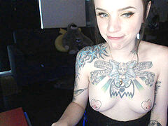 tattooed webcam damsel inhales and gags on dildo