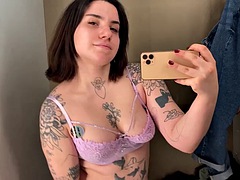 Sheer and mesh clothing tries on sexy tattooed alternative model