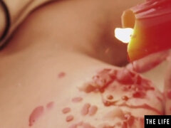 These gorgeous lesbians enjoy hot wax play while licking pussy - Lesbian