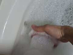 I masturbate in the shower. I like my little cock.