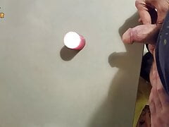 Homemade handjob and big load on a candle. Jerking off in a homemade amateur video, big cock and big load.