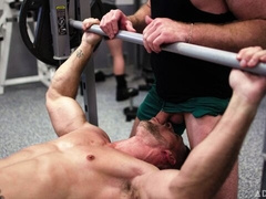 Muscular gay men fuck in front of everyone