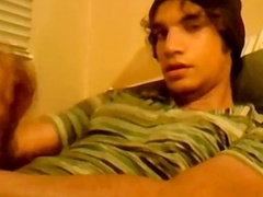 Hung lad films himself jerking off his massive gay cock