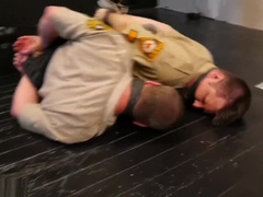 2 beefy cops bound gagged and struggling.