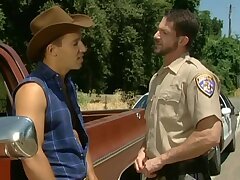 Beefy Cop sucks cock