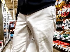 Public freeballing in grocery store. Caught a few guys staring at my visible cock outline