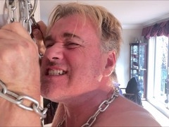 Muscular gay hunk Domrodhunkdad gets chained up and spanked hard