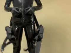 Condom fellow dressed in rubber gear