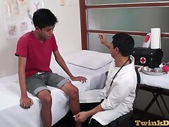 Uniformed Asian doctor fingering and toying twinks ass