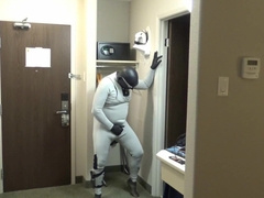 at motel window and door I jizz dressed in bastard wetsuit, silicone spandex hood