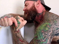 Jack Dixon gets barebacked by stud Carlo Cox in the restroom