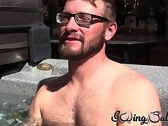 Gay with glasses shows balls before masturbating with buddy