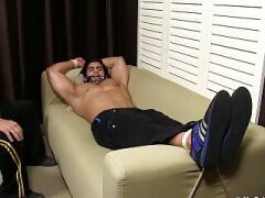 Handsome gay restrained to have his toes licked and sucked