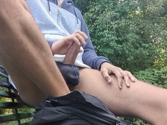 Amateur Slimb8r enjoys some public stroking on a park bench