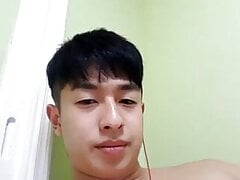 Cute asian guy showing on cam