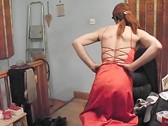 Crossdressing in a sexy red prom dress