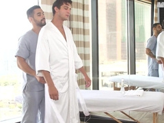 Muscular man gives him a massage and a blowjob after