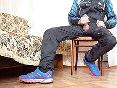 Russian boy sits on a stool and strokes