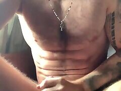 Fit hottie wanks his long, thick uncut cock, plays with foreskin and tastes precum