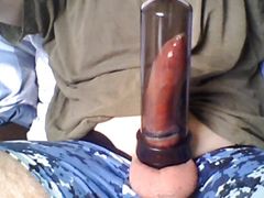 Dick With Condom And Cockring In Vacuum Pump