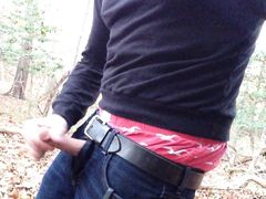 Public wanking in the woods, sagging, jerking and cumming. I jerk off in the woods and cum in my jeans