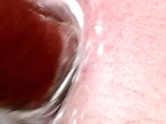 The ass of the student is spread wide with two fists