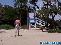 Dicksucking jock lifeguard fucked on beach