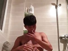 Chinese man solo handjob big cumshot in the toilet
