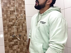 Bearded in the bathroom playing with his Big Cock until he cums and spreads sperm