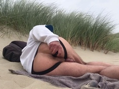 Risky public adventure at the beach: Full nudity, anal fun, and loads of cum!