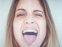 Cumtribute tongue out