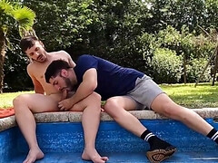 The pool boy and the curious fellow are doing it poolside