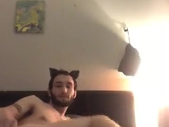Nubile stud dressed in cat ears frigs and showcases off his cock-squeezing fuck hole