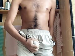 Hairy boy rubs, pees shorts and cums after