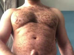 Uncircumcised furry guy showcasing off