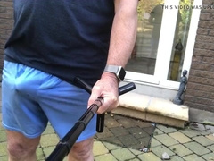 blue cut-offs de-robe nude in garden