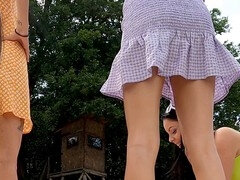 Gorgeous women with massive tits and booties turn an outdoor party into a flirty, no-pants game session