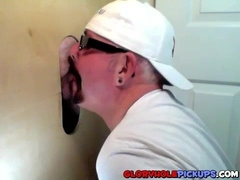Horny dude with glasses enjoys in a glory hole scene