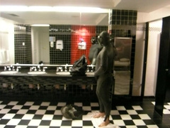 Thief switches into entirely greased love glove gear in public washroom