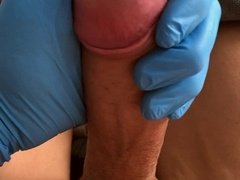 Raw close-up of a gigantic pecker college-aged cm, hand job with a mitten, heavy climax
