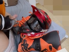 Jizz on biker boots and helmet during playful dildo session