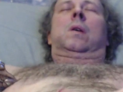 Close-up cock squirt with pinched nipple