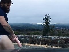 Bearded rides a dildo in public