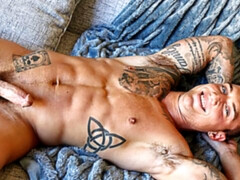 Gunnar Forbes takes off his mask to masturbate